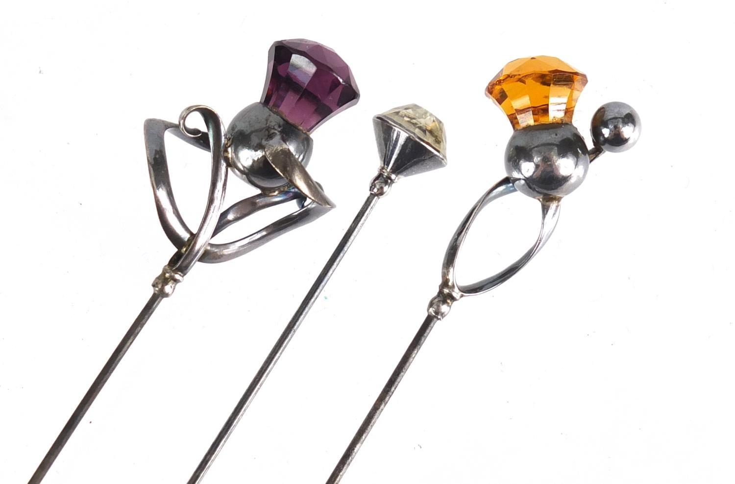 Three Art Nouveau silver hat pins by Charles Horner, the amethyst example Chester 1912, the