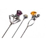 Three Art Nouveau silver hat pins by Charles Horner, the amethyst example Chester 1912, the