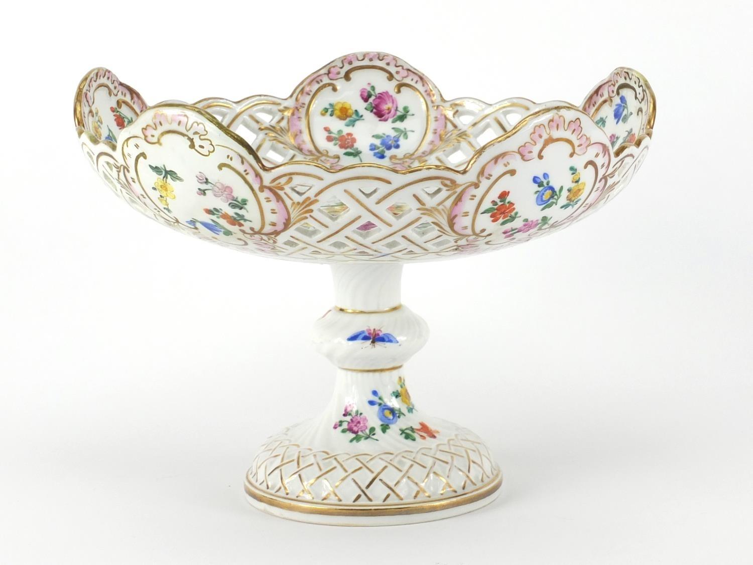 19th century Meissen porcelain tazza having a pierced rim, hand painted with stylised flowers,