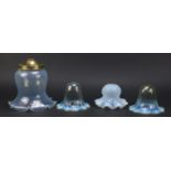 Four Art Nouveau vaseline glass shades including a pair possibly by Powell for Whitefriars, the