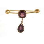 Victorian unmarked gold garnet bar brooch, (tests as 9ct), 4cm in length, 3.3g :For Further