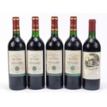Five bottles of Margaux red wine comprising 1986 Domaine de Cure-Bourse and four bottles of 1999