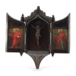 18th century carved oak icon bracket, depicting a crucifixion and two paintings of saints, each