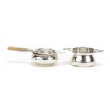 Two silver tea strainers on stands, Birmingham 1935 & 1939, 133.6g :For Further Condition Reports