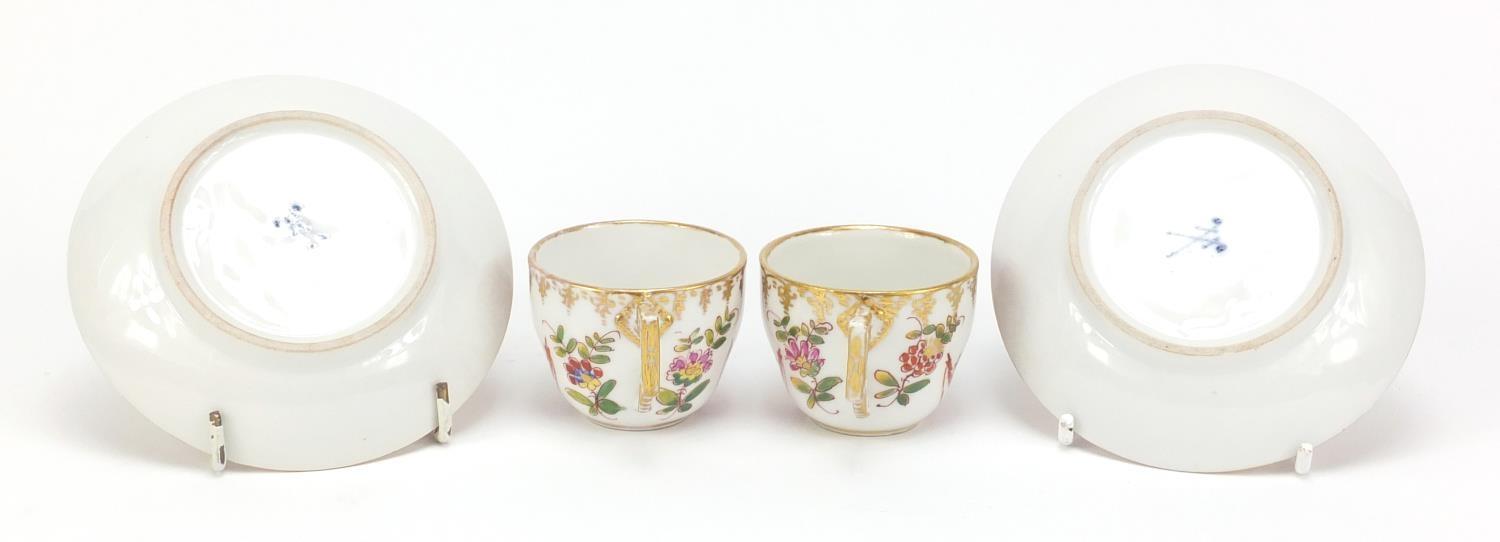 Pair of 19th century Meissen cabinet cups and saucers, each finely hand painted with panels of - Image 7 of 10