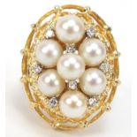 Continental 14K gold, pearl and diamond cluster ring housed in a BR Harman box, size P, 9.0g :For