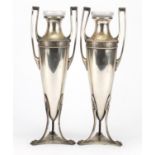 Pair of Art Nouveau silver plated vases with glass liners by WMF, each 32cm high :For Further