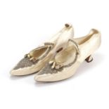 Pair of Victorian silk embroidered shoes, size 5 1/2, each numbered 21021 52 to the underside :For