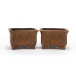 Pair of Yixing terracotta planters incised with flowers and calligraphy, impressed character marks