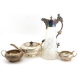 Silver plated three piece tea service and a cut glass claret jug with silver plated mounts and