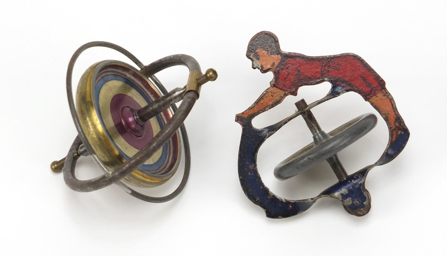 Two vintage spinning top toys : For Further Condition Reports Please visit Our Website, Updated