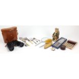 Miscellaneous items including silver plated cutlery, pair of binoculars and a Tony Wood character