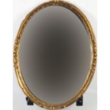 Oval gilt framed mirror with bevelled glass, 43cm x 33cm : For Further Condition Reports Please