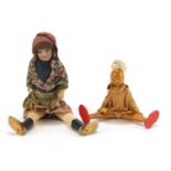 Antique French bisque head doll, marked GO Paris and a wooden example, the largest 30cm high : For