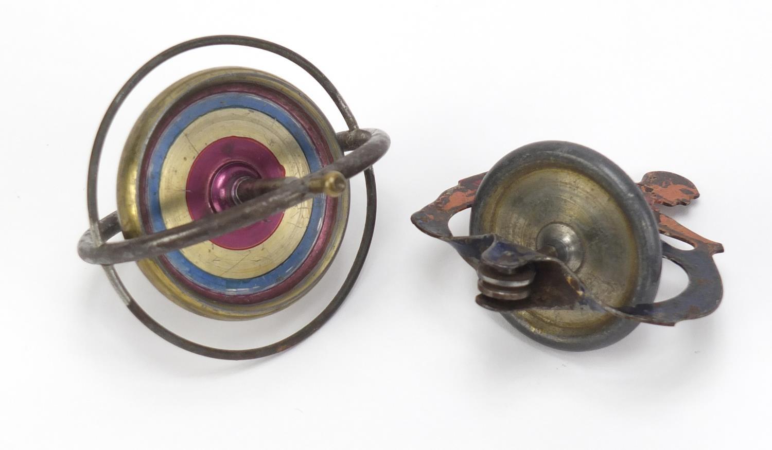 Two vintage spinning top toys : For Further Condition Reports Please visit Our Website, Updated - Image 2 of 2