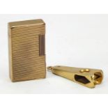 SJ Dupont lighter and a Calibri cigar cutter : For Further Condition Reports Please visit Our