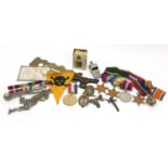 Militaria including British military World War II medals, bosun's whistle and cap badges : For