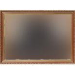 Ornate framed wall hanging mirror with bevelled glass, 82cm x 60cm : For Further Condition Reports