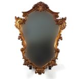 Gilt framed cartouche shaped mirror, 74cm x 54cm : For Further Condition Reports Please visit Our