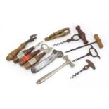 Vintage and later corkscrews and bottle openers including Black & White whiskey and Manns Ale :