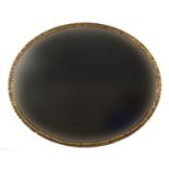 Oval gilt framed mirror with bevelled glass, 52cm x 43cm : For Further Condition Reports Please