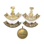 Four military interest Royal Sussex cap badges and a 5th army medal : For Further Condition