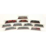 Eleven model railway locomotives with wooden plinth bases and boxes, including King Class GWR,