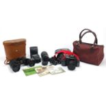 Canon T70 camera and a pair of Telstar binoculars with leather case : For Further Condition