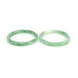 Two Chinese pale green jade bangles, each 8cm in diameter :For Further Condition Reports Please