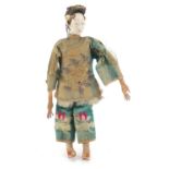 Chinese hand painted lacquered doll wearing embroidered clothes, 26cm in length :For Further
