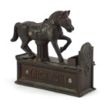 Novelty Trick Pony cast iron money bank, 16.5cm wide :For Further Condition Reports Please Visit Our