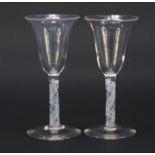 Pair of George III style wine glasses with air twist stems, each 15cm high :For Further Condition
