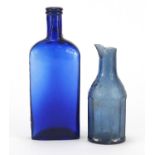 Two antique glass bottles comprising Blackwood & Co ink bottle and Mexican Hair Renew cobalt blue