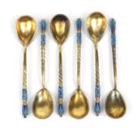 Set of six Russian silver gilt and enamel teaspoons, each with impressed 84 mark, 13cm in length,
