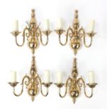 Set of four Regency style two branch brass wall sconces, 31cm high :For Further Condition Reports