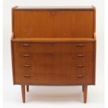 Danish vintage bow front bureau, the fall enclosing a fitted interior above four drawers, with PMJ