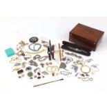Costume jewellery including wristwatches, necklaces, bracelets and earrings housed in a rosewood box