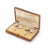 9ct gold and mother of pearl gentlemen's dress stud and cufflink set, housed in a Finnigans Ltd
