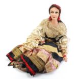 Large vintage traditional Spanish doll with painted features and wearing earings,90cm high :For