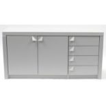 Contemporary grey side cabinet fitted with four drawers and a pair of cupboard doors enclosing shelf