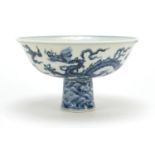 Chinese blue and white porcelain stem cup, hand painted with dragons amongst clouds, 17cm