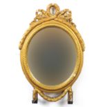 Oval gilt framed mirror with swag design, 49cm high :For Further Condition Reports Please Visit