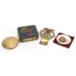 Objects including a Macfarlane sample biscuit tin and brass AA car badge :For Further Condition
