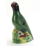 Large Chinese hand painted porcelain parrot, 38cm high :For Further Condition Reports Please Visit