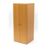 Beech two door cupboard by John Coyle, enclosing three shelves, 117.5cm H x 48cm W x 43cm D :For