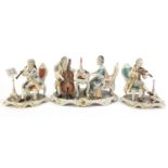 Three hand painted Dresden Kunst musician figure groups, the largest 26cm wide :For Further