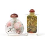 Two Chinese glass snuff bottles, each internally hand painted, the largest 8.5cm high :For Further