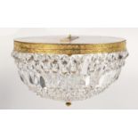 Circular brass and cut crystal bag chandelier, 40cm in diameter x 20cm high :For Further Condition