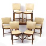 Art Deco walnut draw-leaf dining table and six chairs including two carvers with cream leather backs