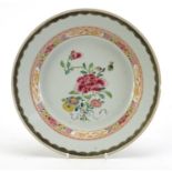 Chinese porcelain shallow dish, hand painted in the famille rose palette with flowers and dragons